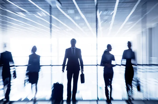 Silhouettes of business people — Stock Photo, Image