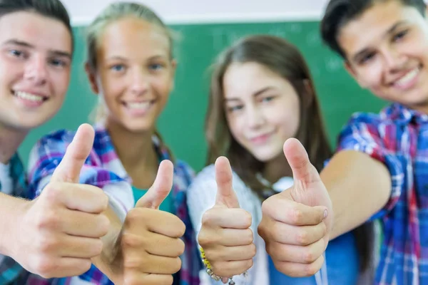 Teens in school — Stock Photo, Image