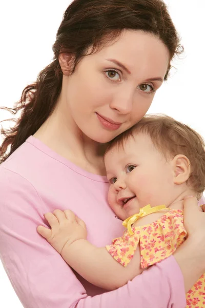 Moeder die haar kleine baby — Stockfoto