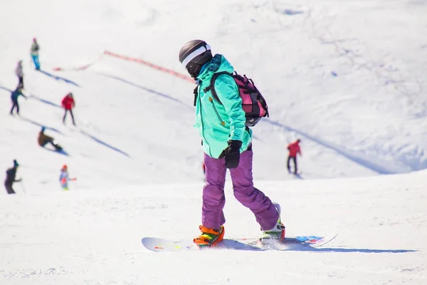 Snowboarder skating  in  ski resort — Stock Photo, Image