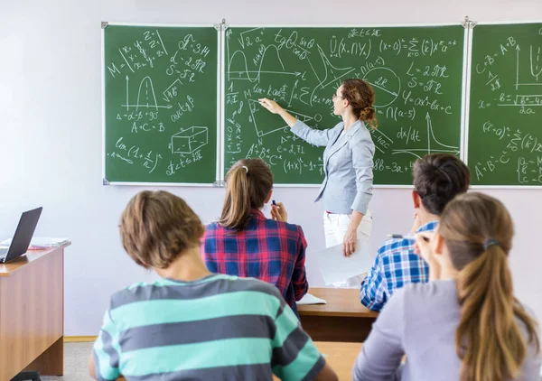 Teens in school — Stock Photo, Image