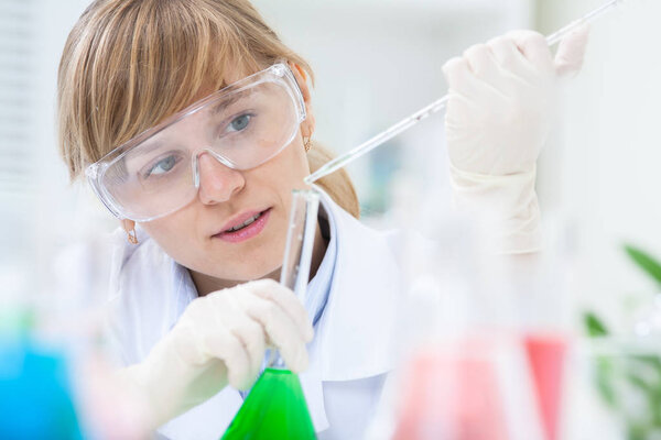 Researcher working with chemicals