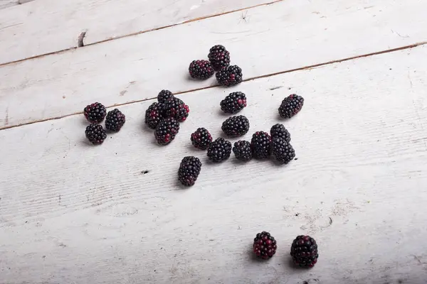 Blackberry on wooden table — Stock Photo, Image