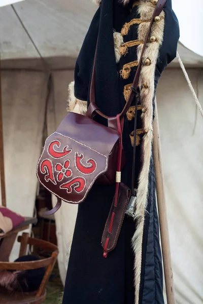 Embroidered bag and ancient coat — Stock Photo, Image