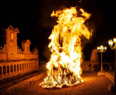 LEONFORTE, SICILY - APRIL, 19: Big fire next to the Granfonte fountain during the traditional Good Friday procession on April 19, 2019