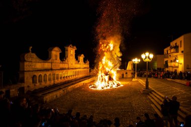 LEONFORTE, SICILY - APRIL, 19: Big fire next to the Granfonte fountain during the traditional Good Friday procession on April 19, 2019