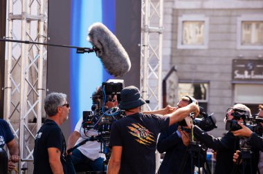 TRIESTE, ITALY - SEPTEMBER, 07: Behind the scene. Film crew team filming movie scene on outdoor location on September 07, 2016 