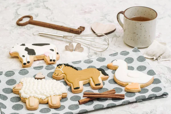 Cute hand made cookies in a shape of animals — Stock Photo, Image