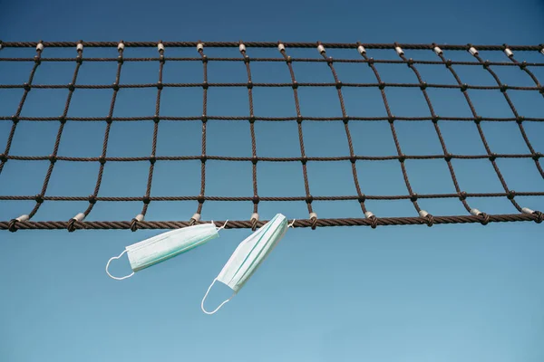 Covid Surgical Mask Hanging Net Empty Beach Volley Field — Stock Photo, Image