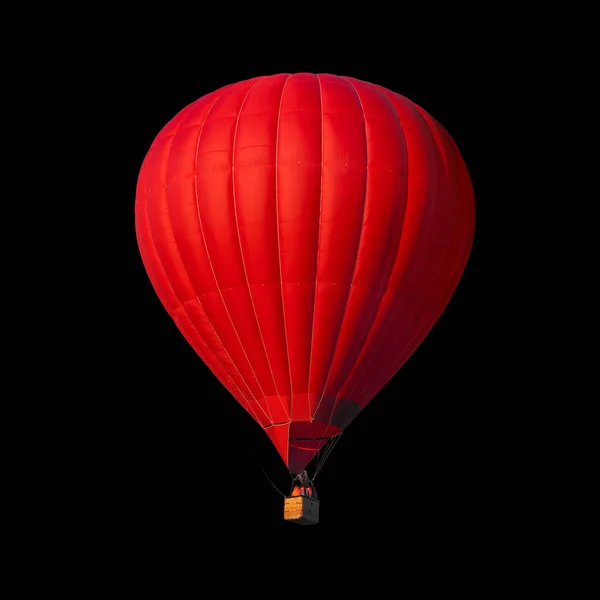 Balão de ar vermelho isolado em preto — Fotografia de Stock