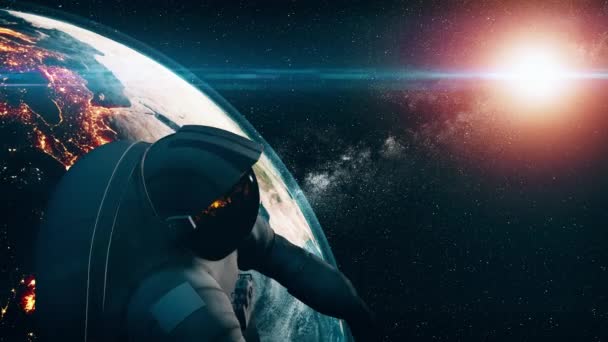 Realistinen kosmonautti ulkoavaruudessa pyörivä maapallo — kuvapankkivideo