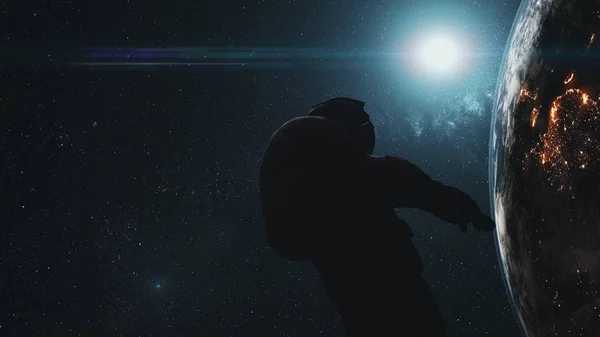 Astronauta człowiek sylwetka wobec realistyczny Ziemia — Zdjęcie stockowe