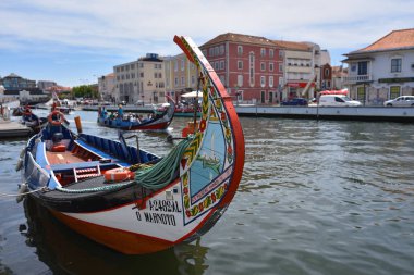 Traditional boats in Vouga river, Aveiro, Portugal clipart