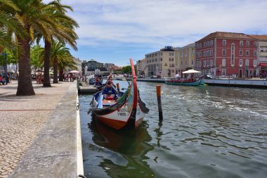 Traditional boats in Vouga river, Aveiro, Portugal clipart