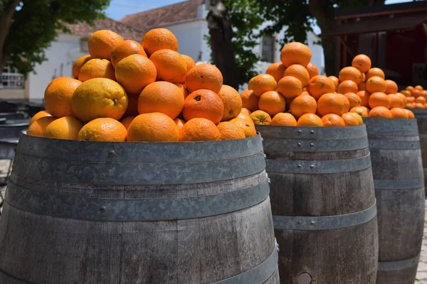 Oranges in barrels