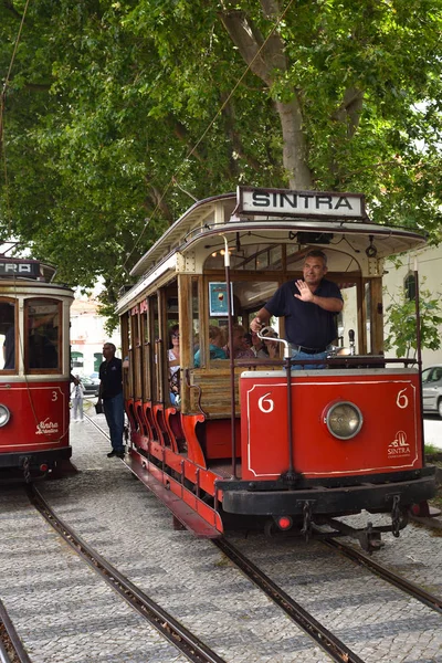 Sintra street scene with old red trams — Stock Photo, Image