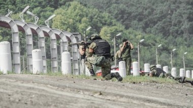 Russia, Belgorod, July 25, 2016: exercises of special military units. storm the captured base in various ways clipart