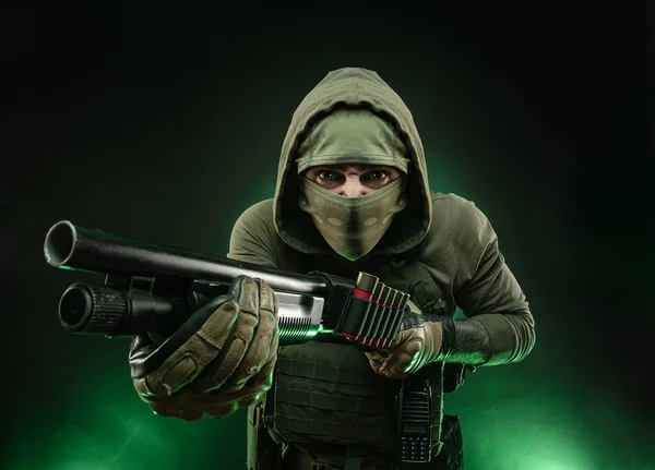 Mercenary soldier with a shotgun — Stock Photo, Image