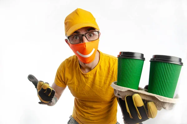 the guy delivering packages in a virus-proof mask, the courier with coffee and pizza