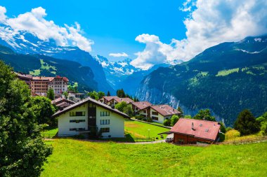 Traditional houses, Lauterbrunnen valley, Switzerland clipart