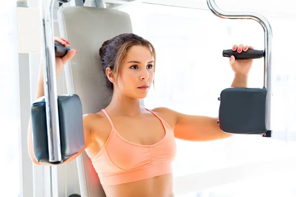 Young woman getting into shape — Stock Photo, Image