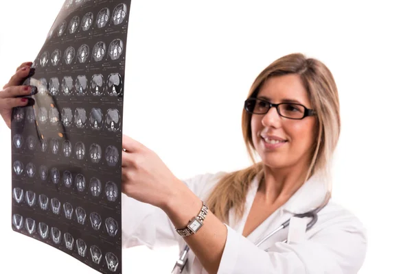 Doctor looking at x-ray — Stock Photo, Image