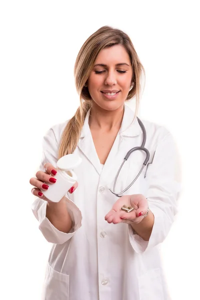 Medic holding pills — Stock Photo, Image