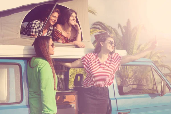 Young girls traveling by car — Stock Photo, Image