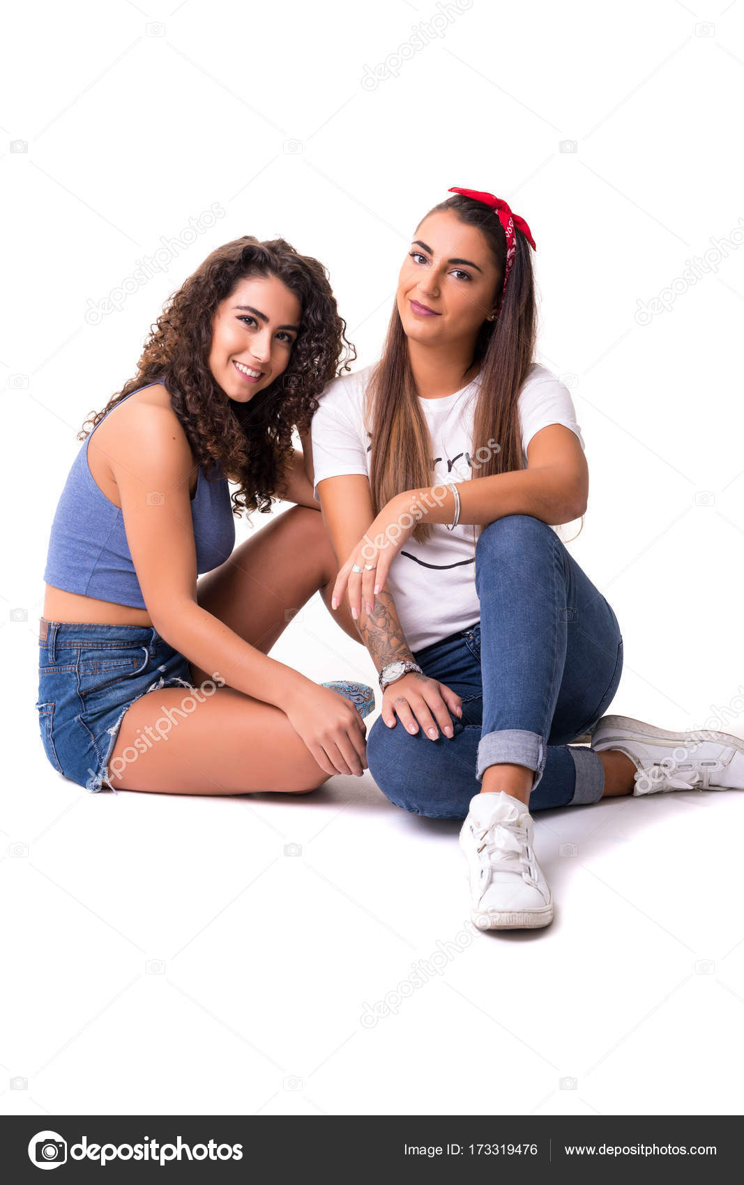 Two friends posing. modern lifestyle. two stylish sexy hipster girls best  friends ready for party. Two young girl friends standing together and  having fun. Stock Photo by ©zamuruev 152774050