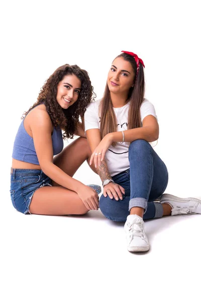 Two friends posing in studio — Stock Photo, Image