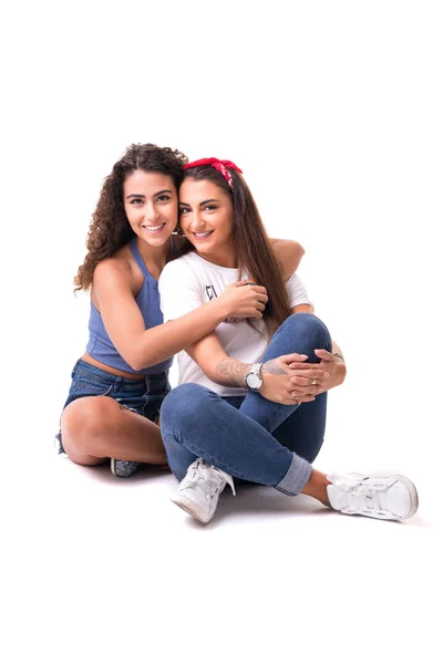 Two friends posing in studio — Stock Photo, Image