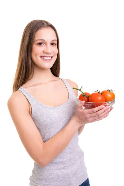 いくつかの新鮮なトマトを保持している若い女性 白い背景 健康的な食事のコンセプトです ダイエット — ストック写真