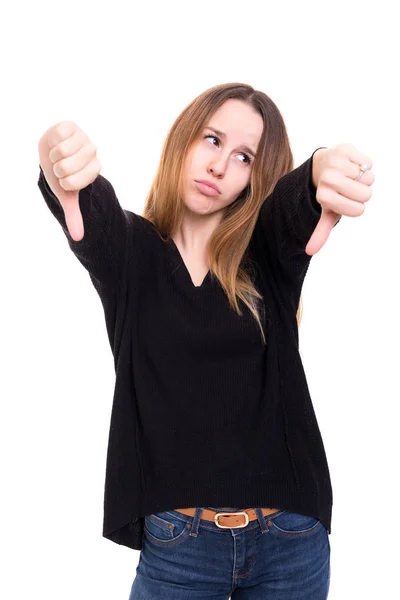 Студійний Знімок Молодої Жінки Сигналізує Великі Пальці Вниз Ізольовані Білому — стокове фото