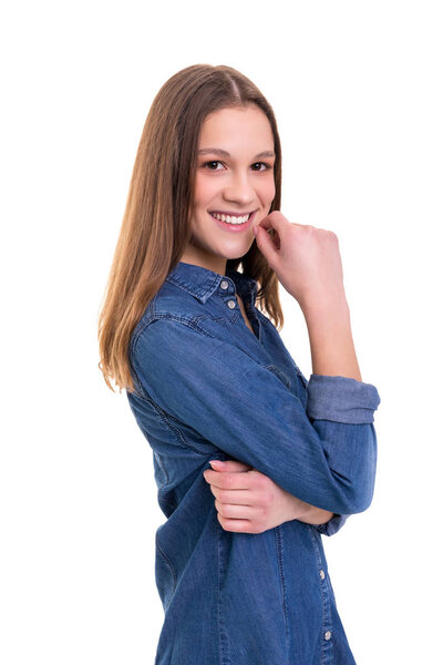 Studio shot of young casual woman on white background