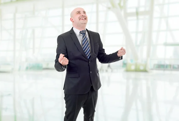 Young business man winning, at the office — Stock Photo, Image