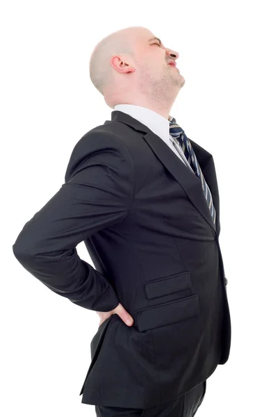 Jovem empresário com forte dor nas costas, isolado no fundo branco — Fotografia de Stock