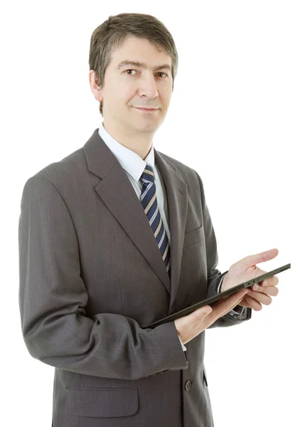 Jonge zakenman met een tablet pc, geïsoleerd — Stockfoto