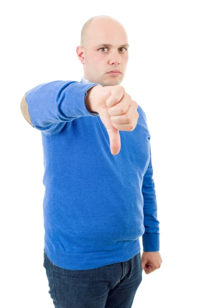 Casual man giving thumbs down, isolated on white — Stock Photo, Image