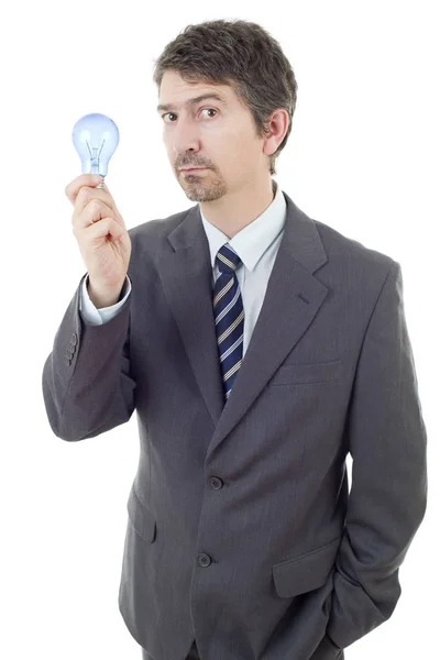 Dumme Geschäftsmann mit einer Lampe isoliert auf weiß — Stockfoto