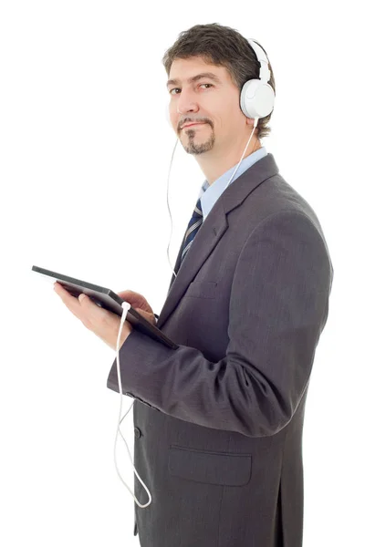 Hombre de negocios que trabaja con la tableta PC y auriculares, aislado — Foto de Stock