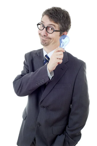 Silly business man with a lamp isolated on white — Stock Photo, Image