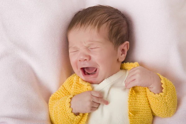 young baby crying, studio picture