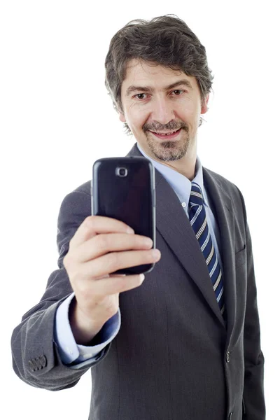 Beyaz arka plan üzerinde izole bir selfie alarak iş adamı — Stok fotoğraf