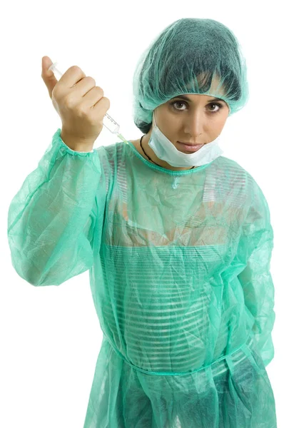 Young woman nurse portrait with a syringe, isolated — Stock Photo, Image