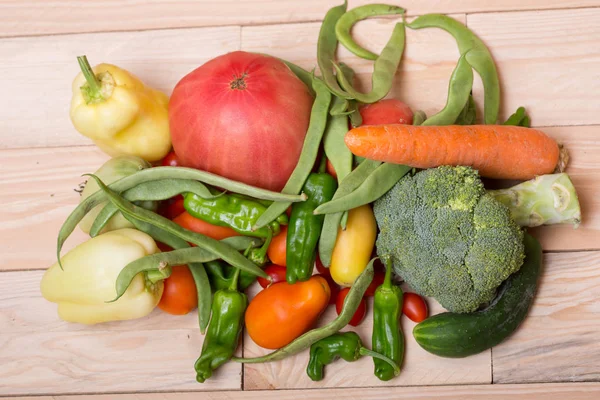 Vegetables on a wooden surface Stock Image