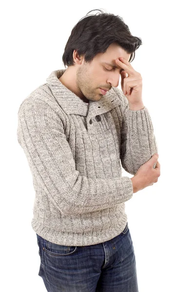 Young casual man with a headache, isolated on white — Stock Photo, Image