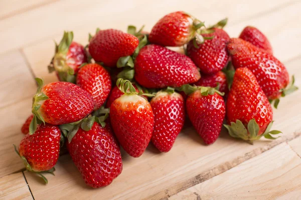 Strawberries on a wooden table, studio picture — Stock Photo, Image