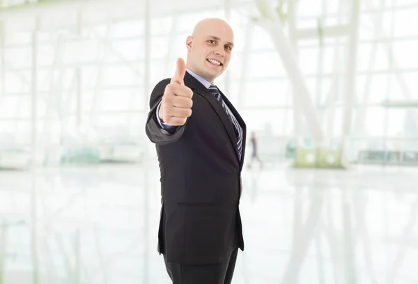Young business man going thumb up, at the office — Stock Photo, Image