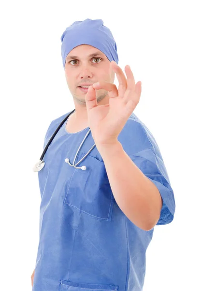 Sorrindo médico ganhando, com um estetoscópio em seus ombros. isolado — Fotografia de Stock