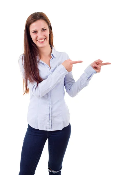 Joven feliz hermosa mujer señalando, aislado en blanco — Foto de Stock